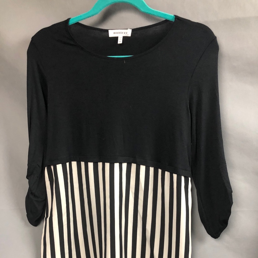 Top with half flowy black and white stripe bottom
